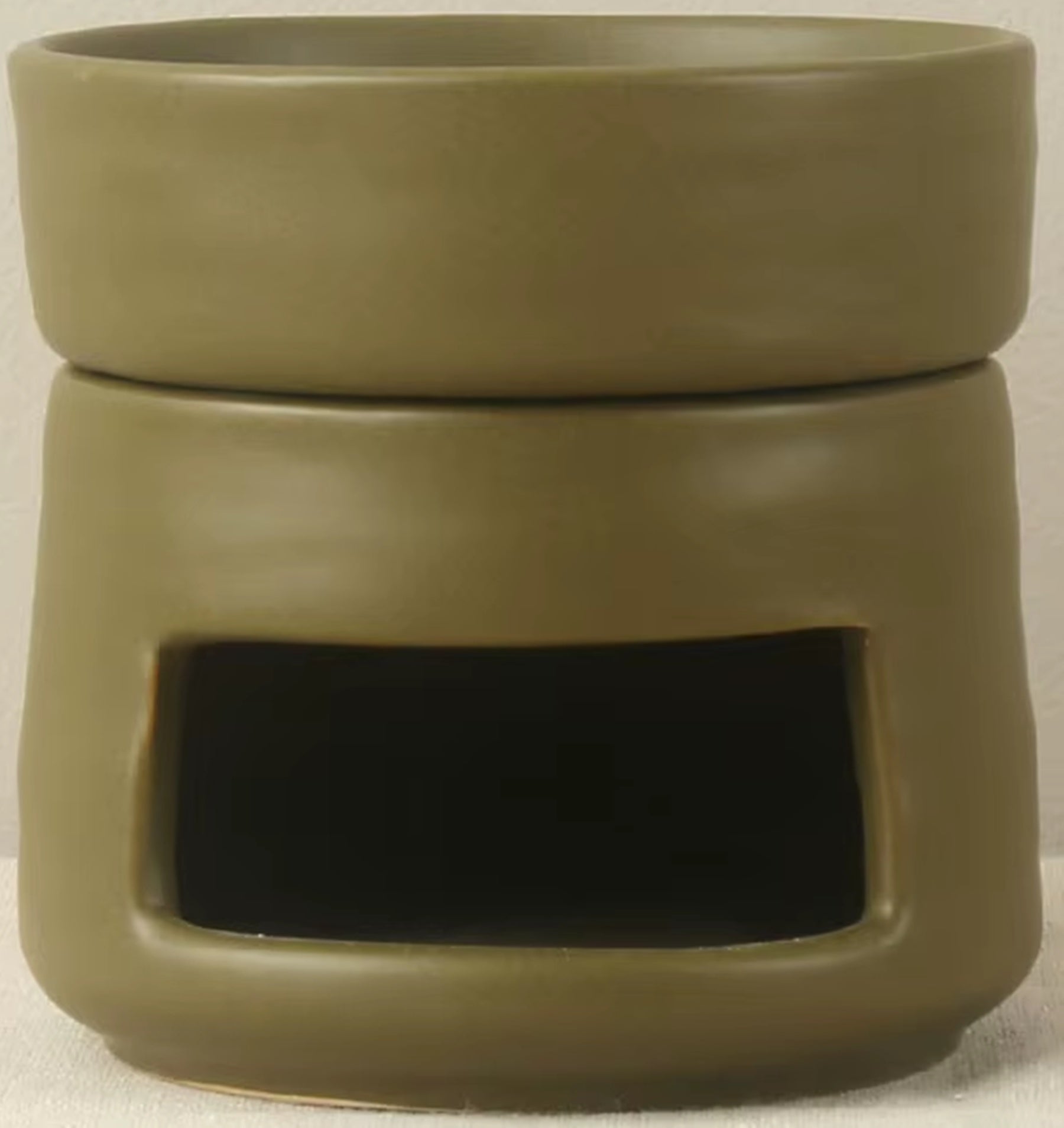 rustic olive color round minimalist style oil diffuser for tealight candles to warm essential oils or melt wax