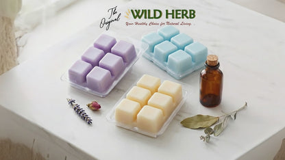 bottom of wax melt packages on a white surface with wild herb logo